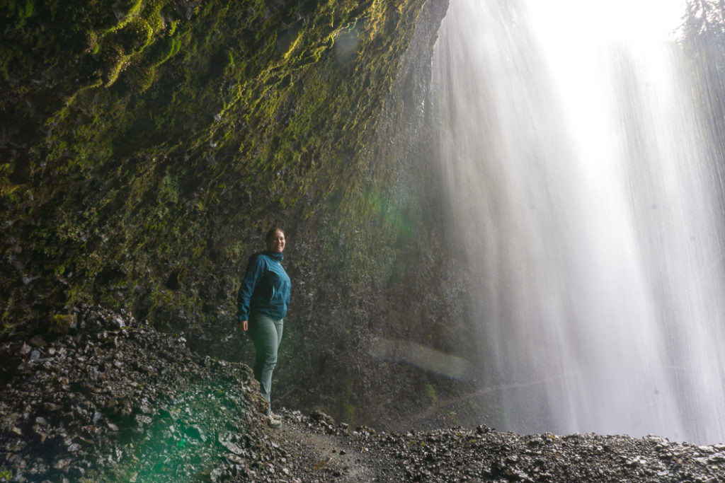 Standing behind Moul Falls, one of the many gorgeous waterfalls in Wells Gray Provincial Park near Kamloops, BC