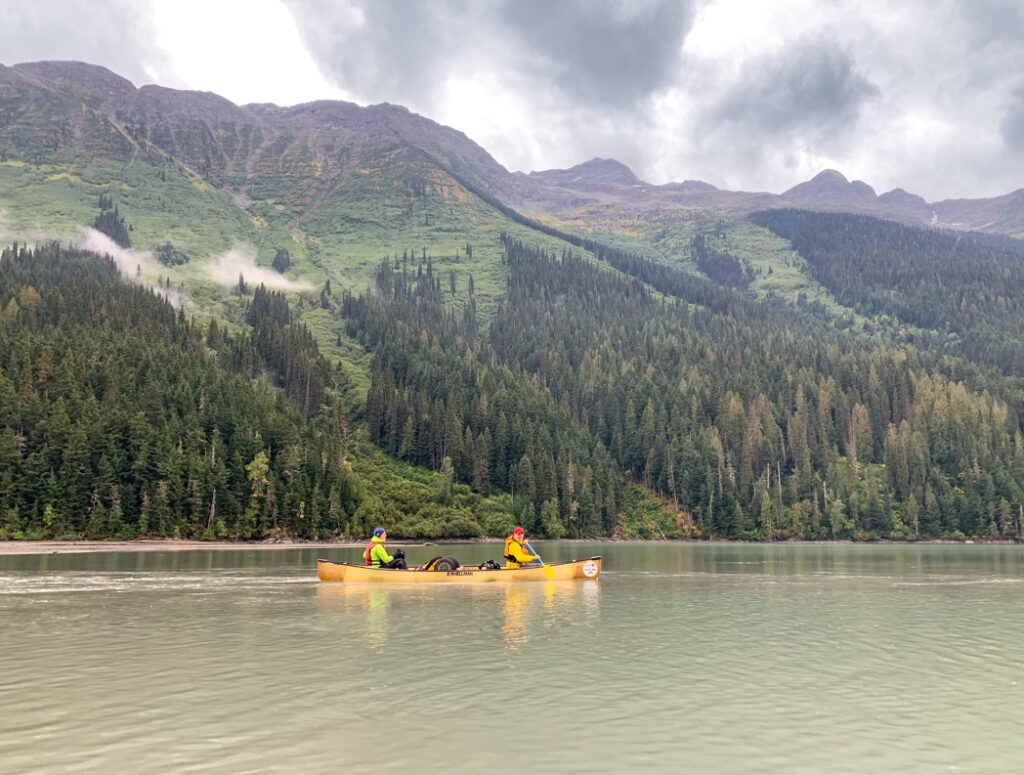 Paddling next to mountains on Lanezi Lake