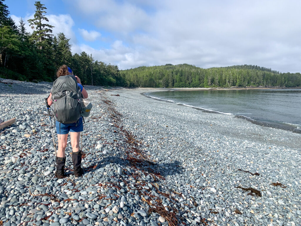 Hiker on the beach near Nahwitti River