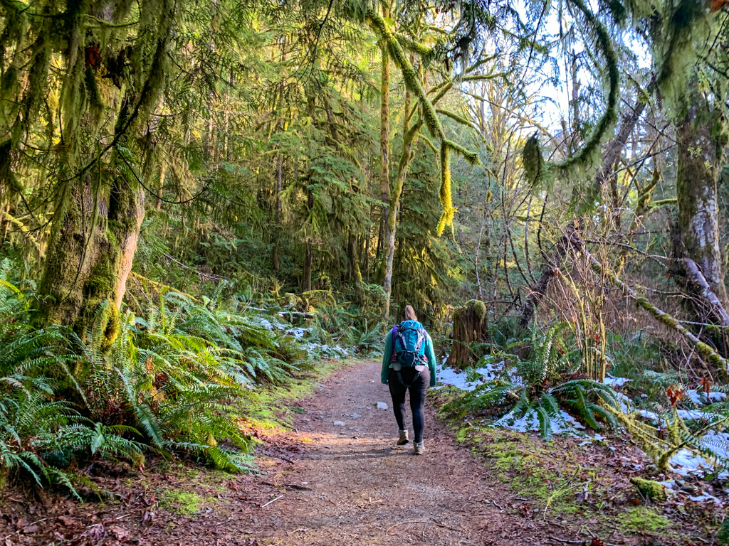 A woman hiking in leggings