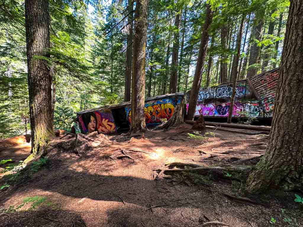Train cars in Whistler almost falling into the river