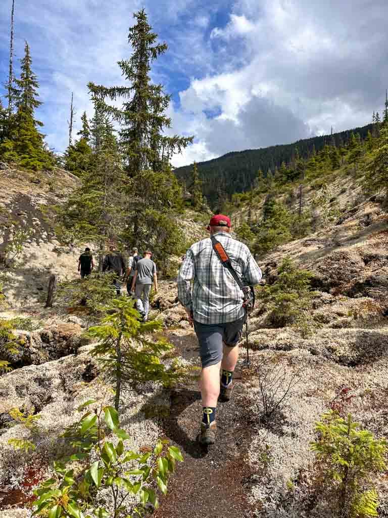 Hiking through lava on the way to Tseax Cone in Nisga'a Memorial Lava Bed Provincial Park