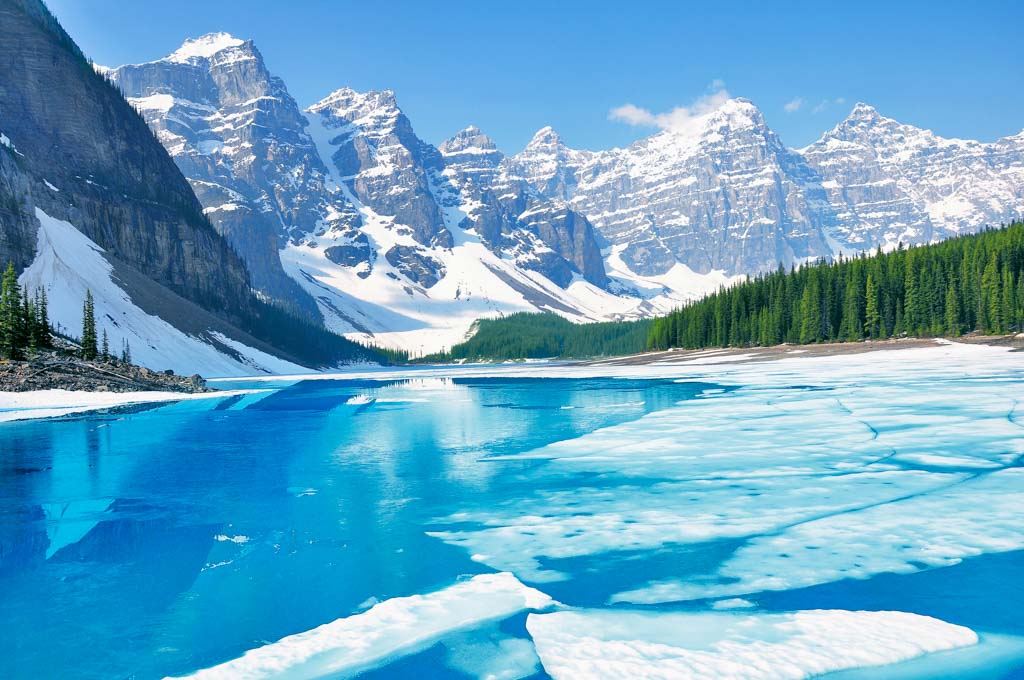 Moraine Lake with melting ice - one of the best things to do in Banff in spring.