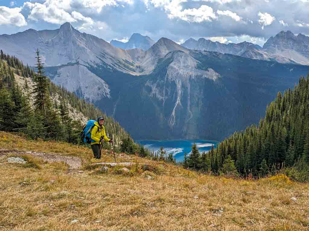 A hiker on the Wonder Pass Trail above Marvel Lake