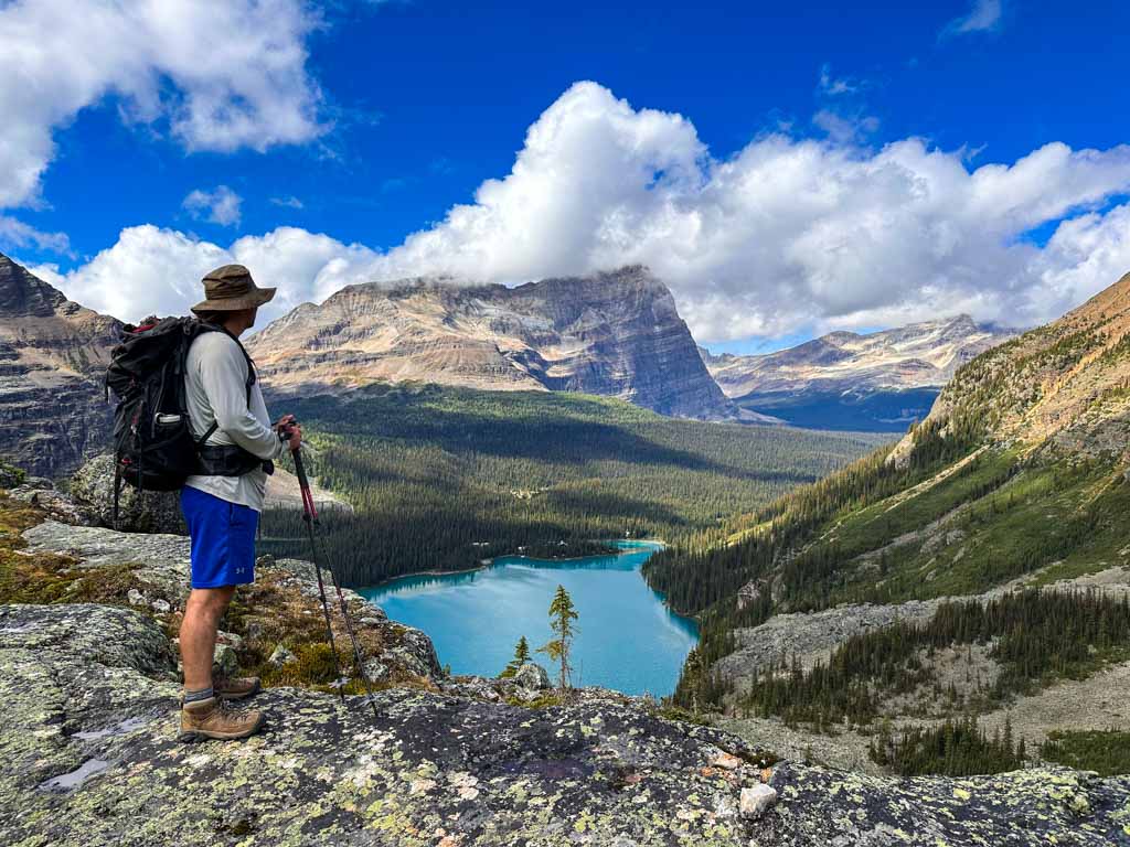 A hiker takes a break on the Yukness Ledges