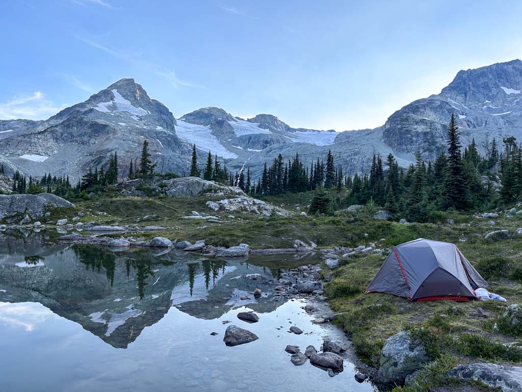 A tent next to a lake at Semaphore Lakes