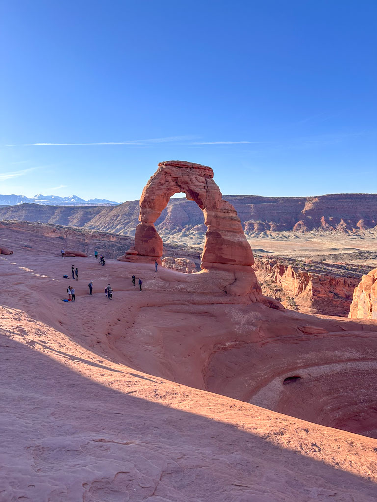 Delicate Arch in Arches National Park in early morning shadows