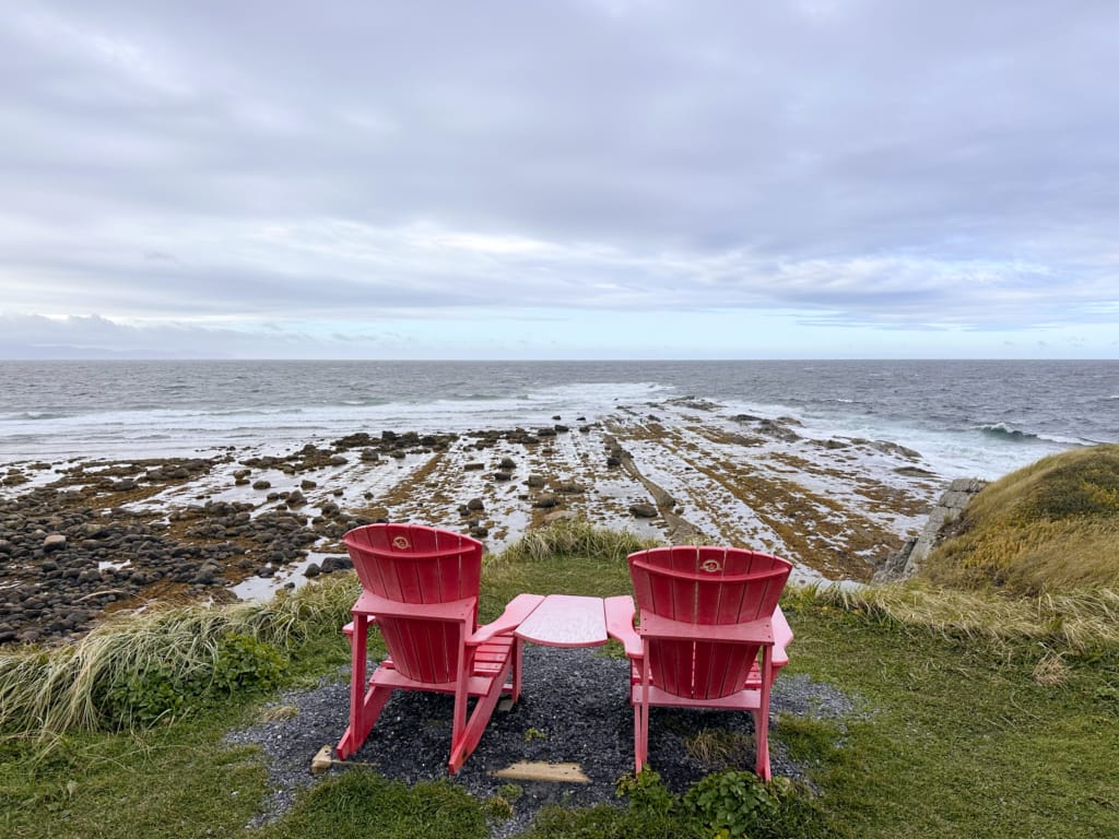 Parks Canada red chairs at Green Point in Gros Morne National Park