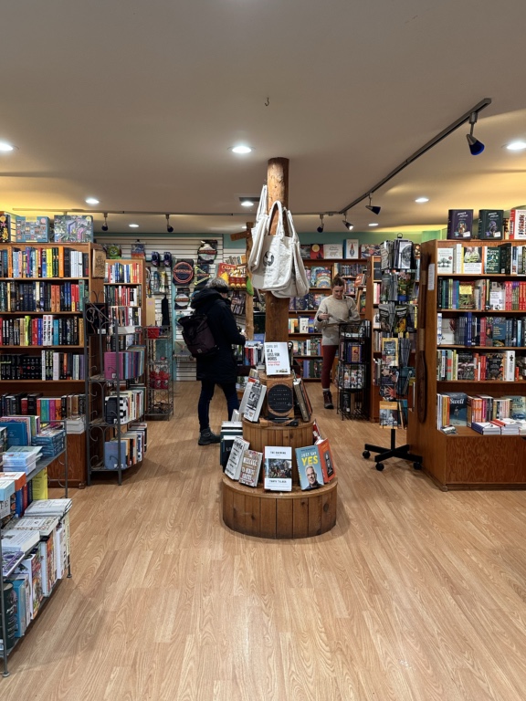 People shop inside Mermaid Tales Book Shop in Tofino