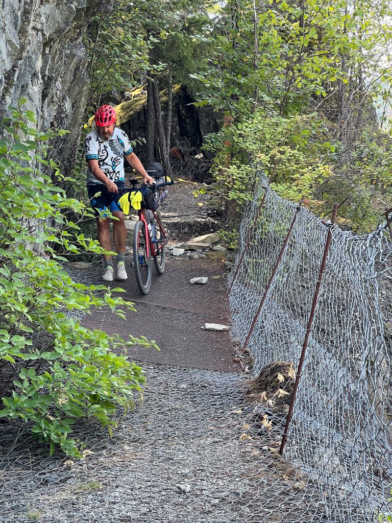 A bikepacker on the Sea to Sky Trail