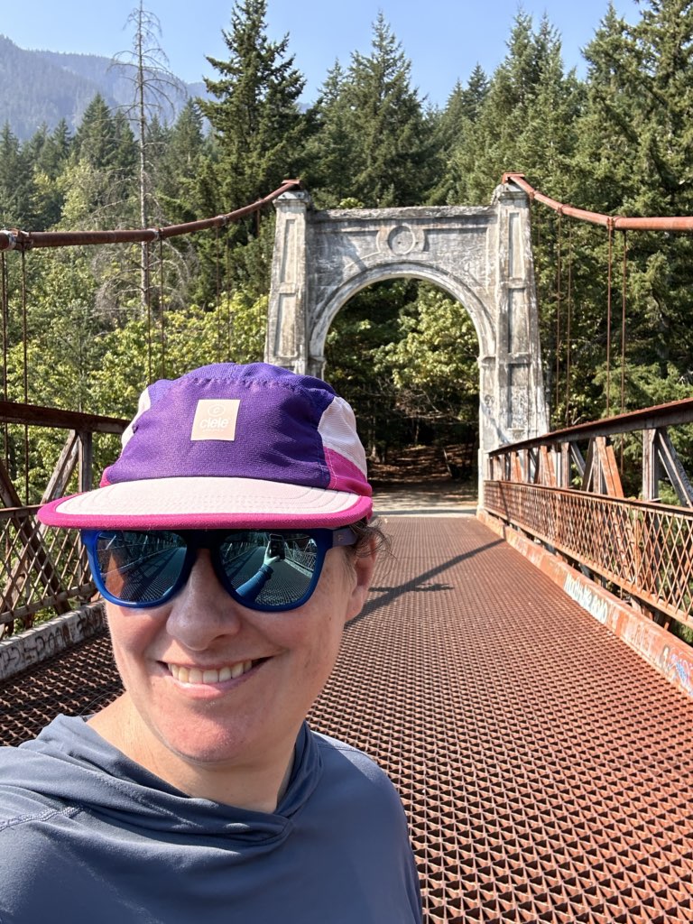 A woman takes a selfie at Alexandra Bridge in the Fraser Canyon