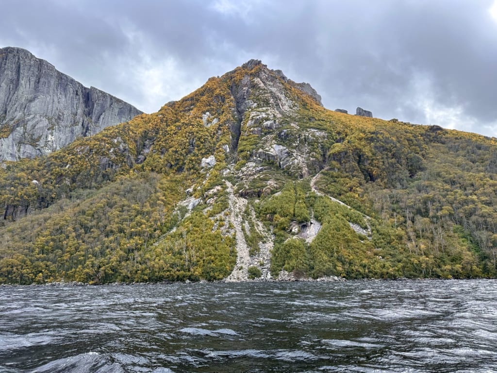 Fall colours on the cliffs of Western Brook Pond in Gros Morne National Park