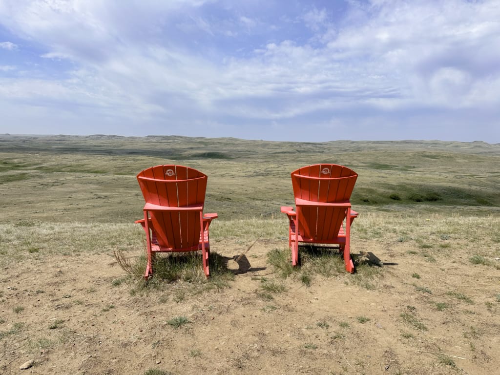 Parks Canada red chairs on the Badlands Parkway