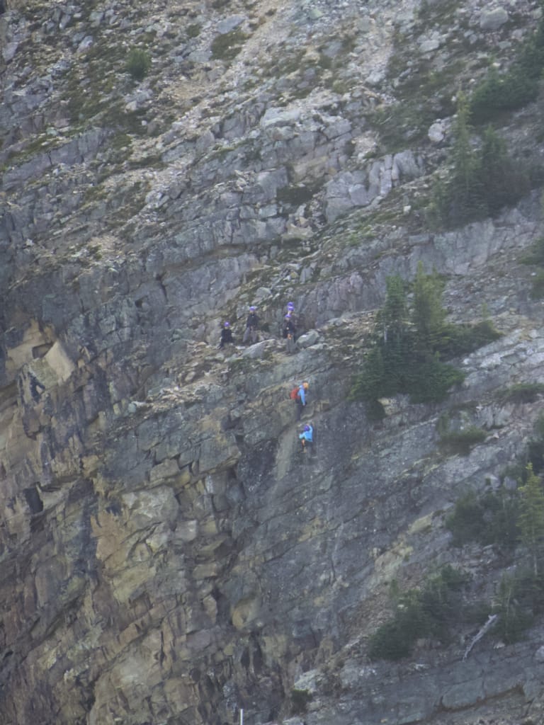 Climbers on the via ferrata at Kicking Horse