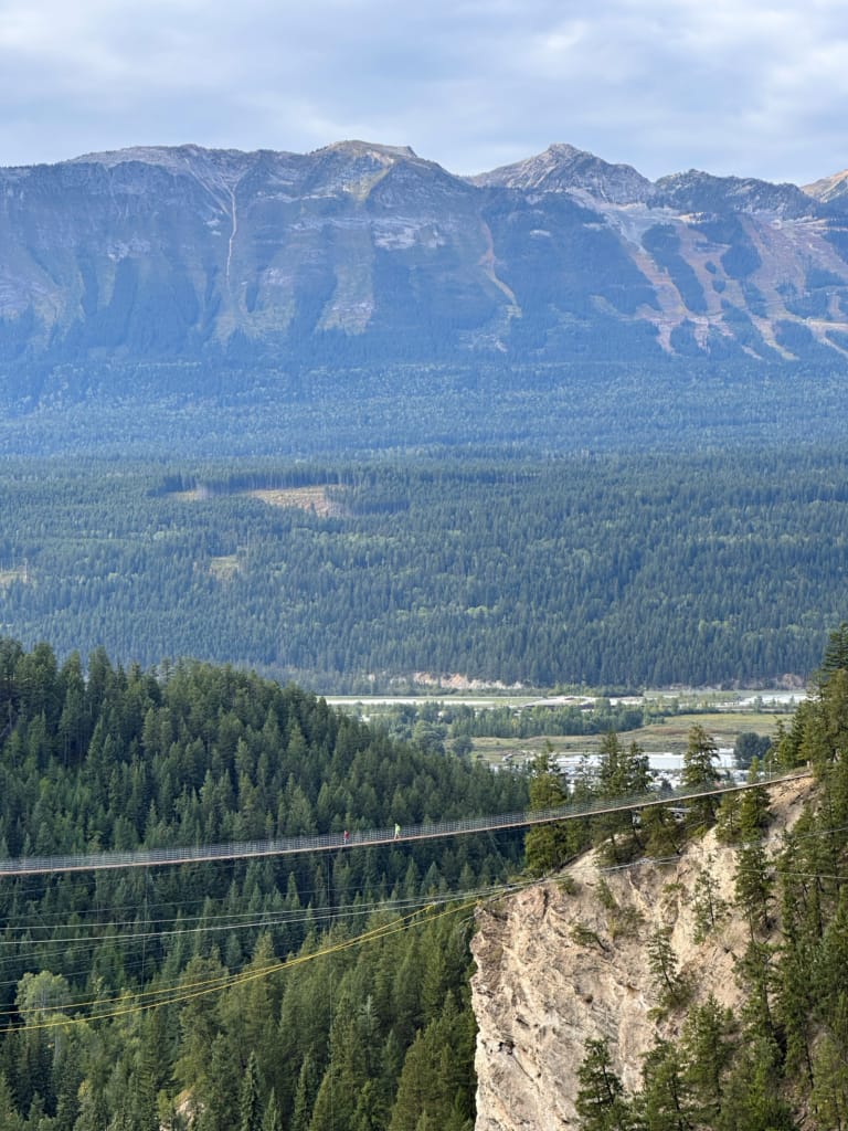Golden Skybridge with mountains in the background