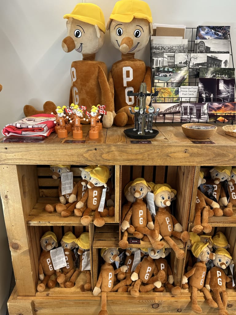 Mr. PG merch including plushies.
