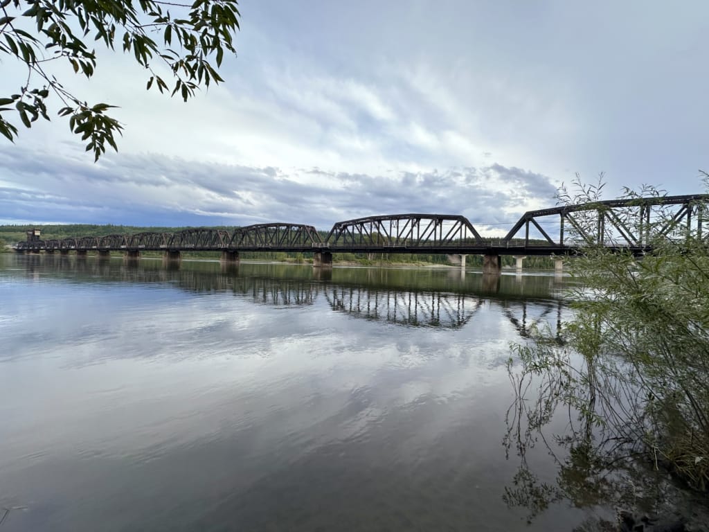 Railway bridge over the Fraser River. Walking the trails from Cottonwood Island to see the bridge is one of the best things to do in Prince George